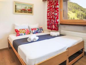 Postel nebo postele na pokoji v ubytování Apartment Rosablanche E36 by Interhome