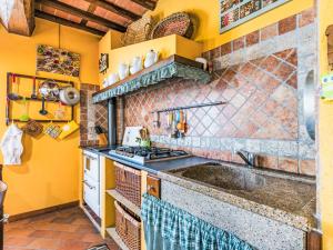A kitchen or kitchenette at Villa Luana by Interhome