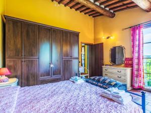 A bed or beds in a room at Villa Luana by Interhome