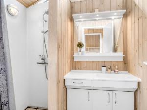Koupelna v ubytování Holiday Home Anne - 100m from the sea by Interhome