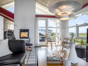 Posezení v ubytování Holiday Home Anne - 100m from the sea by Interhome