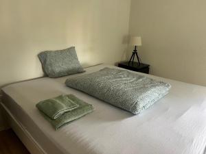 Postel nebo postele na pokoji v ubytování Rocco Guesthouse