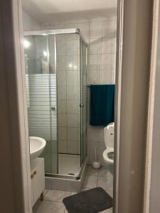 Koupelna v ubytování Rocco Guesthouse + 27 fotografií