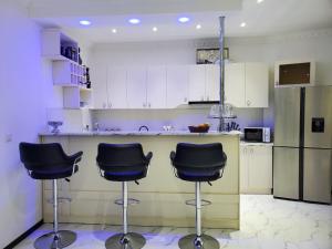 A kitchen or kitchenette at Hotel N