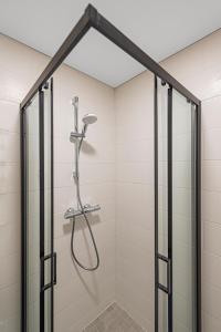 Phòng tắm tại Pramonės Apartment #12 by PoloApartments