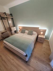 Postel nebo postele na pokoji v ubytování Al Boschetto Rooms