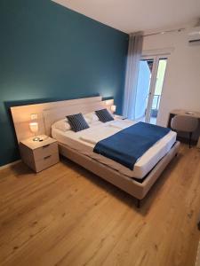 Postel nebo postele na pokoji v ubytování Al Boschetto Rooms
