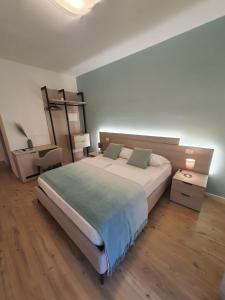 Postel nebo postele na pokoji v ubytování Al Boschetto Rooms
