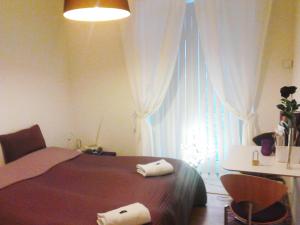 Postel nebo postele na pokoji v ubytování Roskilde B&B