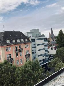a view of a city with a building at Petit nid sympa a Strasbourg in Strasbourg +8 photos