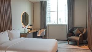 Cama ou camas em um quarto em Waymore Hotel Spa & Casino