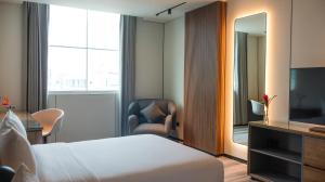 Uma TV ou centro de entretenimento em Waymore Hotel Spa & Casino