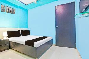 Postel nebo postele na pokoji v ubytování Hotel new shree niwas
