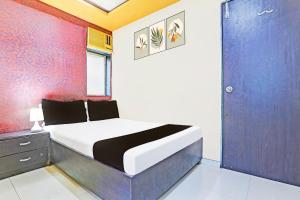 Postel nebo postele na pokoji v ubytování Hotel new shree niwas