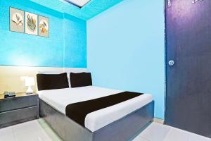 Postel nebo postele na pokoji v ubytování Hotel new shree niwas