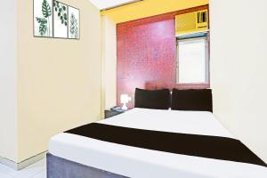 Postel nebo postele na pokoji v ubytování Hotel new shree niwas