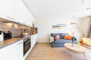 Η κουζίνα ή μικρή κουζίνα στο Ferienwohnung Sanddorn - Scharbeutz