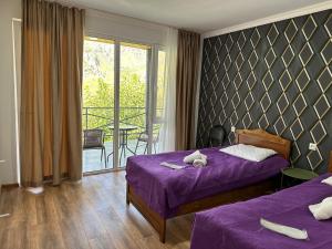 Postel nebo postele na pokoji v ubytování Hotel-GVALA