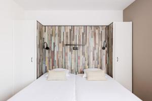 Postel nebo postele na pokoji v ubytování Hotel Cavalli by WP Hotels