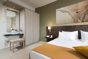 Postel nebo postele na pokoji v ubytování Mayfair Hotel
