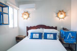 Postel nebo postele na pokoji v ubytování Hotel Aquarius