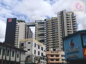 a group of tall buildings in a city at The Majestic Condo Ipoh Home Fairy 5 in Ipoh +4 photos