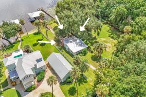 an aerial view of a house with a yard at Nature's Nest Lake House in Lake Wales