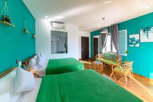 Posezení v ubytování Kivi Homestay Hoi An