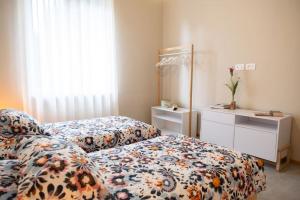 Postel nebo postele na pokoji v ubytování A casa di Piero + 12 fotografií