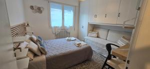 Letto o letti in una camera di Ca' Olivo