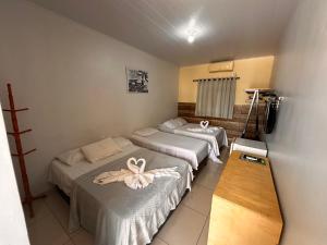 Postel nebo postele na pokoji v ubytování Pousada Cangaço + 14 fotografií