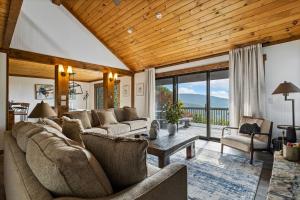 a living room with a couch and a table at Wishlist in Beech Mountain