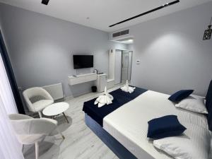 Postel nebo postele na pokoji v ubytování Best Premium Hotel ULUG-BEK