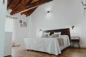 Ένα ή περισσότερα κρεβάτια σε δωμάτιο στο Casa Rural Toledillo