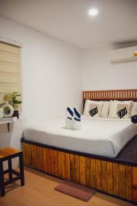 Postel nebo postele na pokoji v ubytování Costa Bed Hua Hin