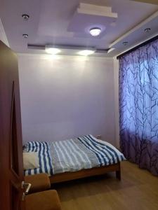 Postel nebo postele na pokoji v ubytování dilihouse97