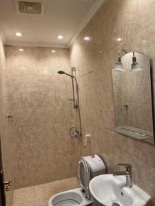 Koupelna v ubytování Al tawfeeg hotel - Al Azizyah