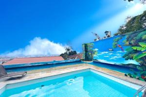 Piscine de l'établissement Inn House Santa Teresa ou située à proximité