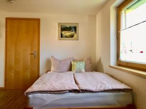 Postel nebo postele na pokoji v ubytování Ferienwohnung Marianne
