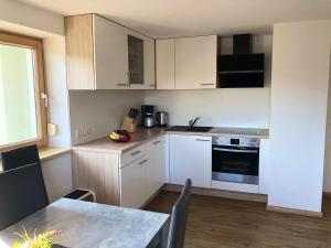 Kuchyň nebo kuchyňský kout v ubytování Ferienwohnung Marianne