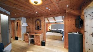 Łóżko lub łóżka w pokoju w obiekcie Sport- und Genusshotel Silvretta