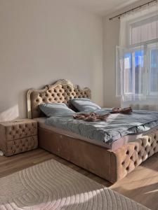 Postel nebo postele na pokoji v ubytování Apartmán Queen