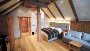 Łóżko lub łóżka w pokoju w obiekcie Sport- und Genusshotel Silvretta