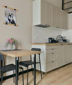 Η κουζίνα ή μικρή κουζίνα στο Hola Apartamenty Nawrot