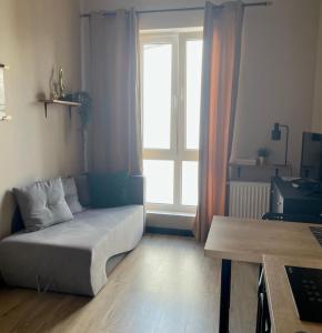 Χώρος καθιστικού στο Hola Apartamenty Nawrot