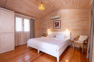 Postel nebo postele na pokoji v ubytování Alicra Hotel Çıralı