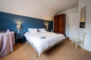 Postel nebo postele na pokoji v ubytování B&B Le 36