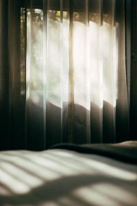 Ein Bett oder Betten in einem Zimmer der Unterkunft Runcu Arequipa