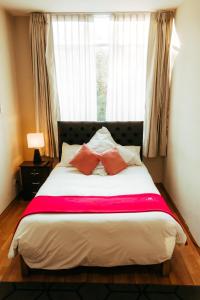 Ein Bett oder Betten in einem Zimmer der Unterkunft Runcu Arequipa