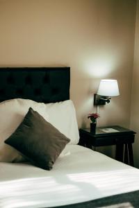 Ein Bett oder Betten in einem Zimmer der Unterkunft Runcu Arequipa